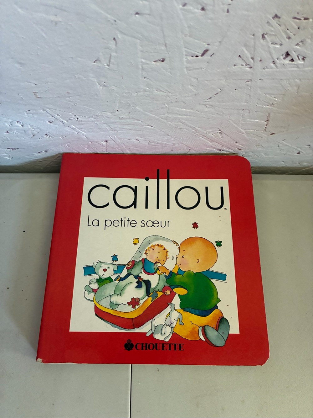 Caillou La petite soeur Board Book - Red by Chouette